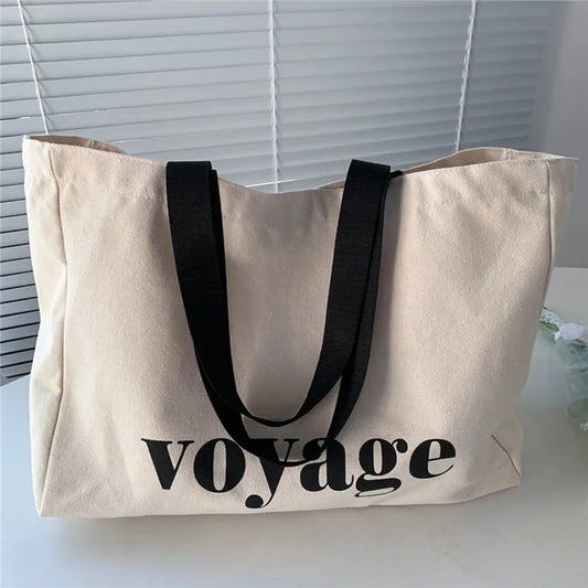 The Voyage Tote: The Gloss Take on a Timeless Essential